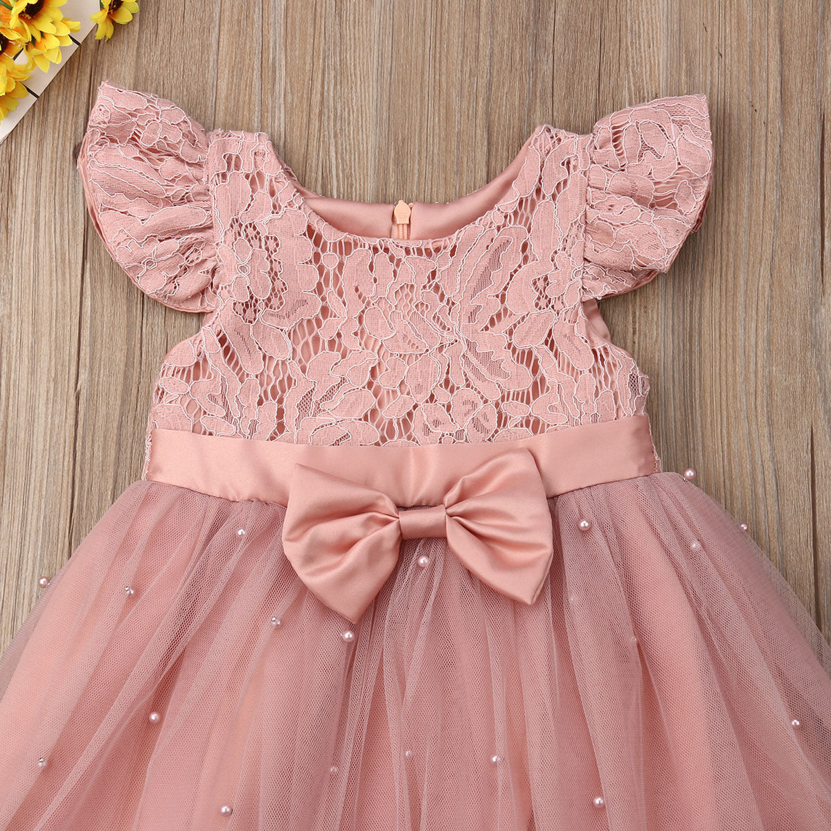 Süßes rosa Perlen Babykleid