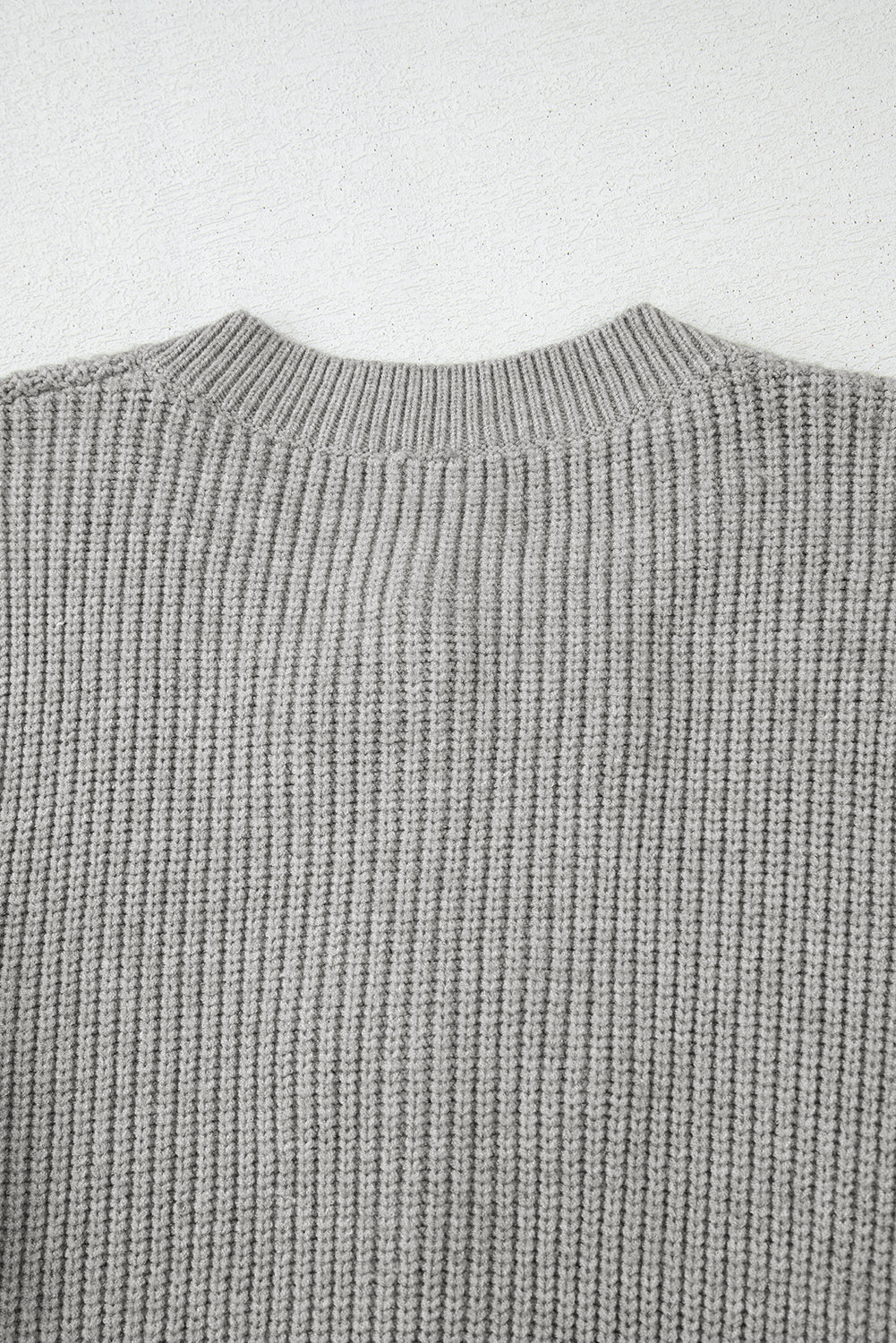 Philippine Gray – Süße, kurze Strickjacke mit Schleife vorn