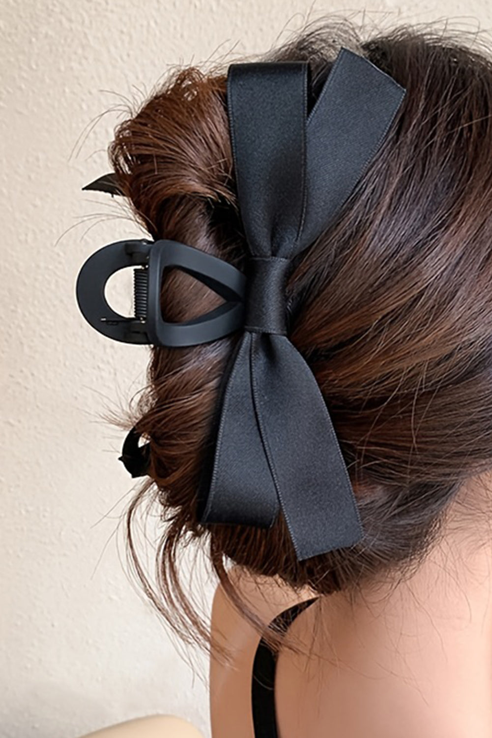 Pinza para el pelo con decoración de lazo negro