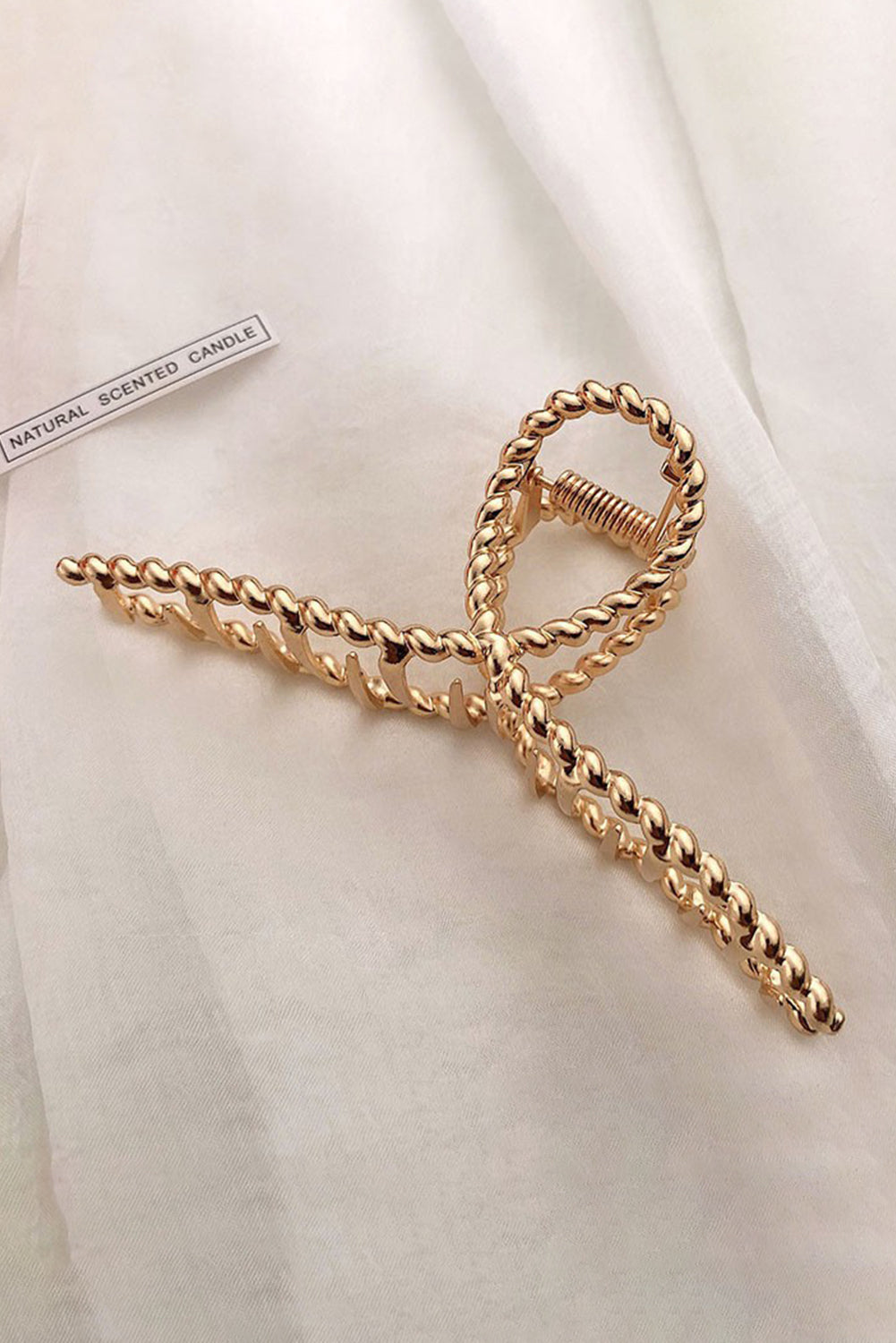 Große Haarspange aus goldfarbener Twist-Legierung
