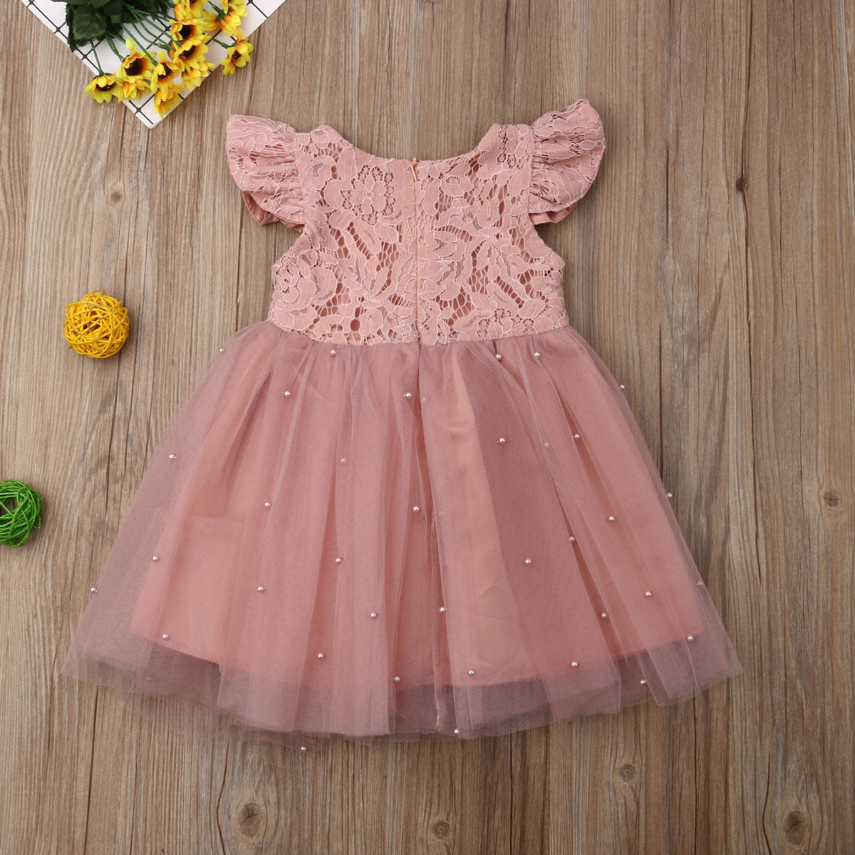 Süßes rosa Perlen Babykleid