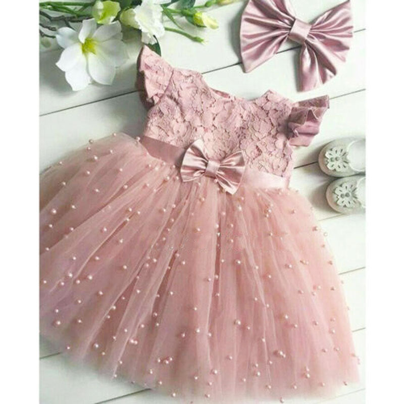 Süßes rosa Perlen Babykleid