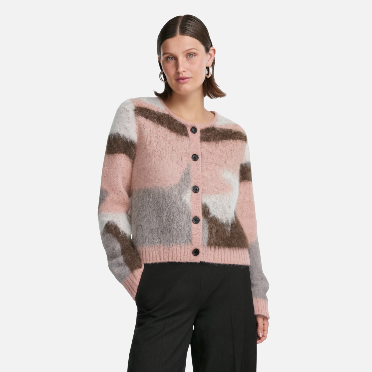 Two piece set of contrasting knitted jacket and suspender