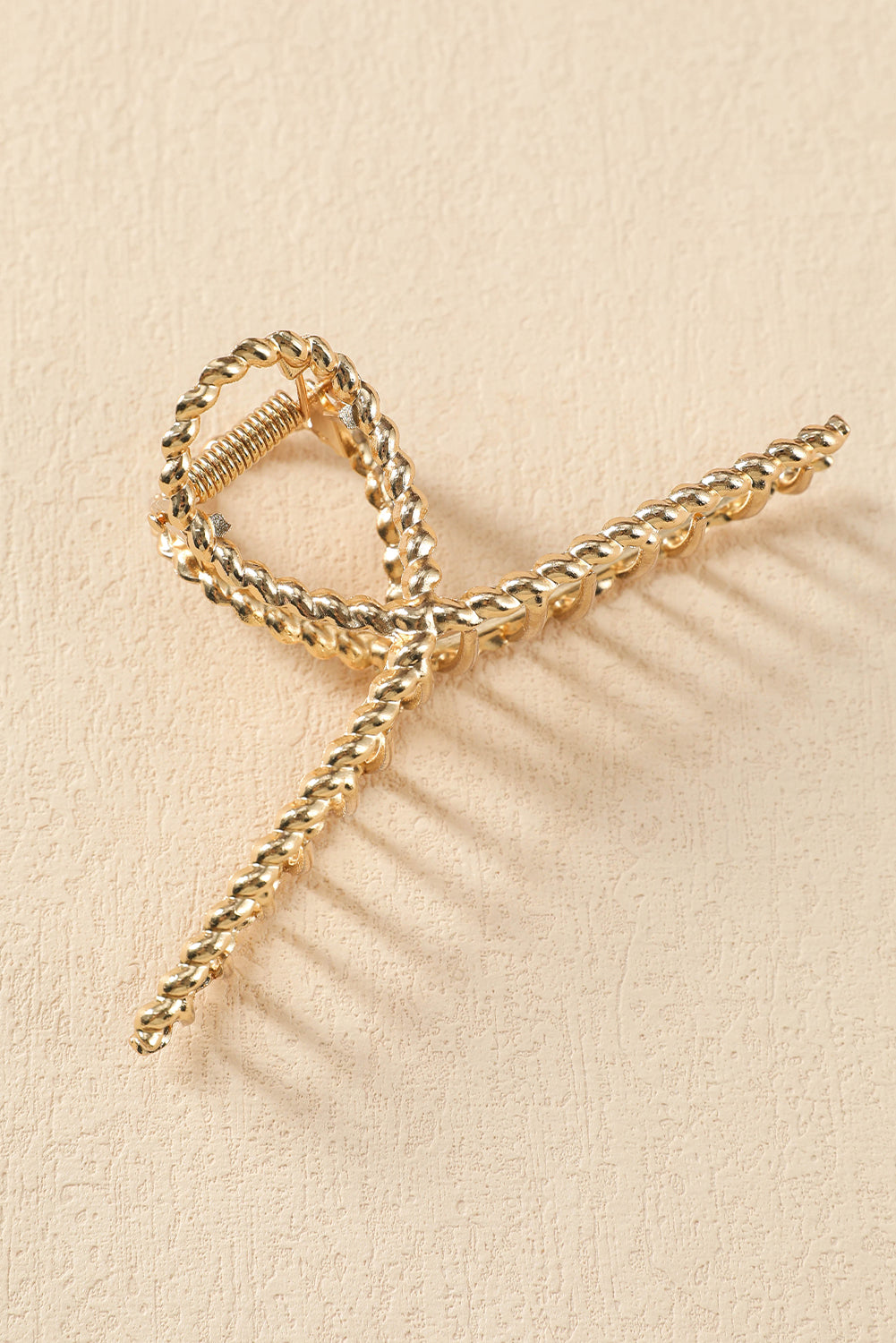 Große Haarspange aus goldfarbener Twist-Legierung