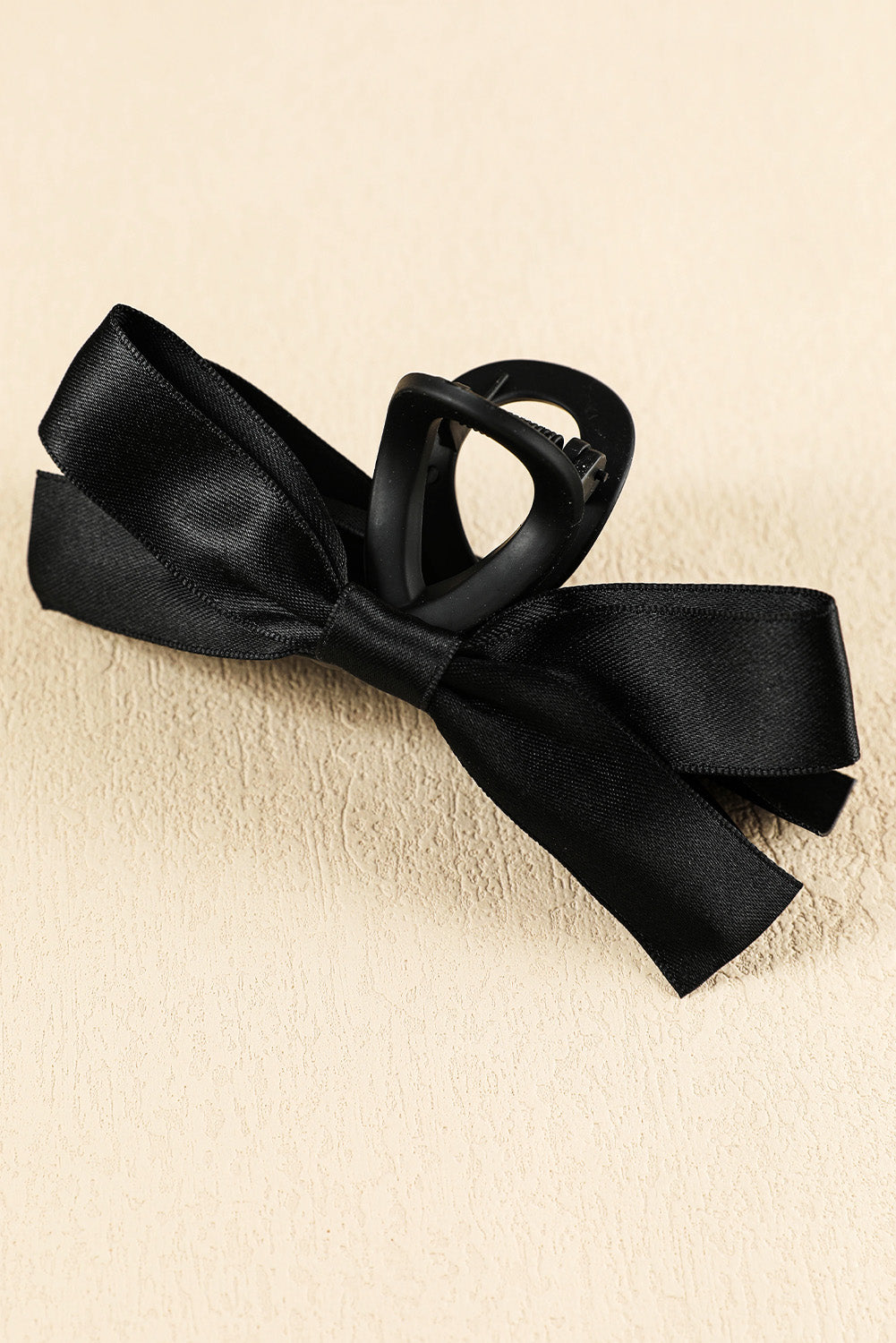Pinza para el pelo con decoración de lazo negro