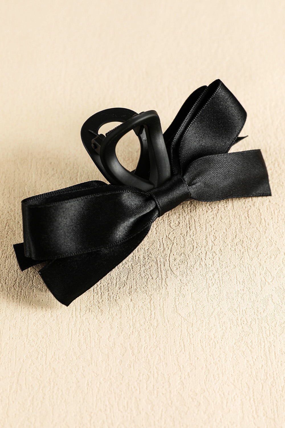 Pinza para el pelo con decoración de lazo negro