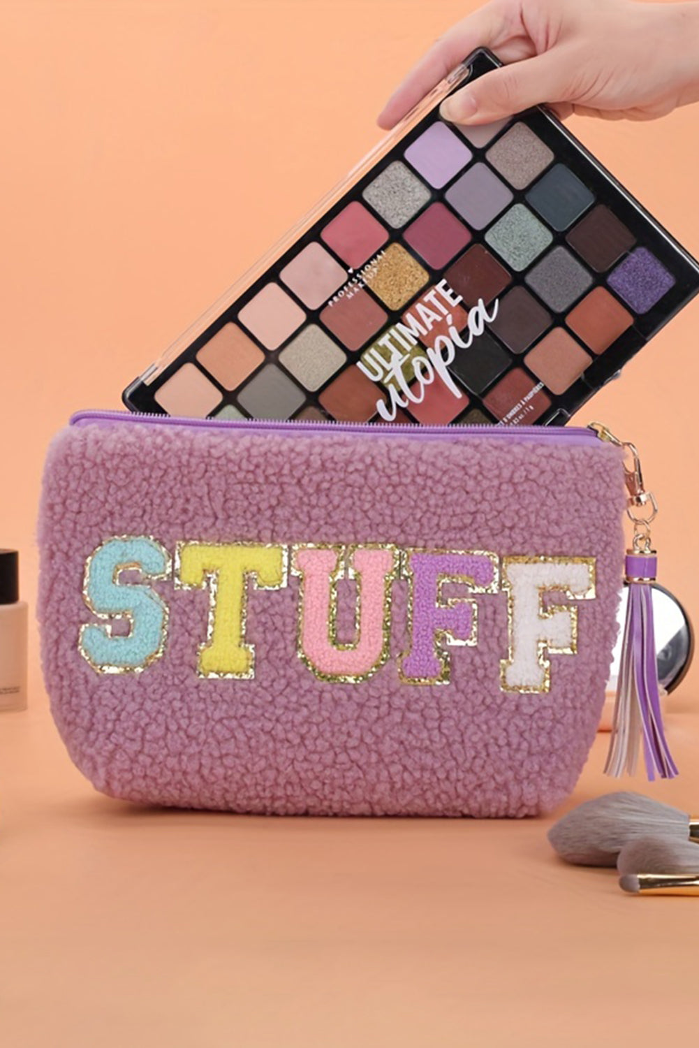 Bonita bolsa de maquillaje morada con estampado de letras