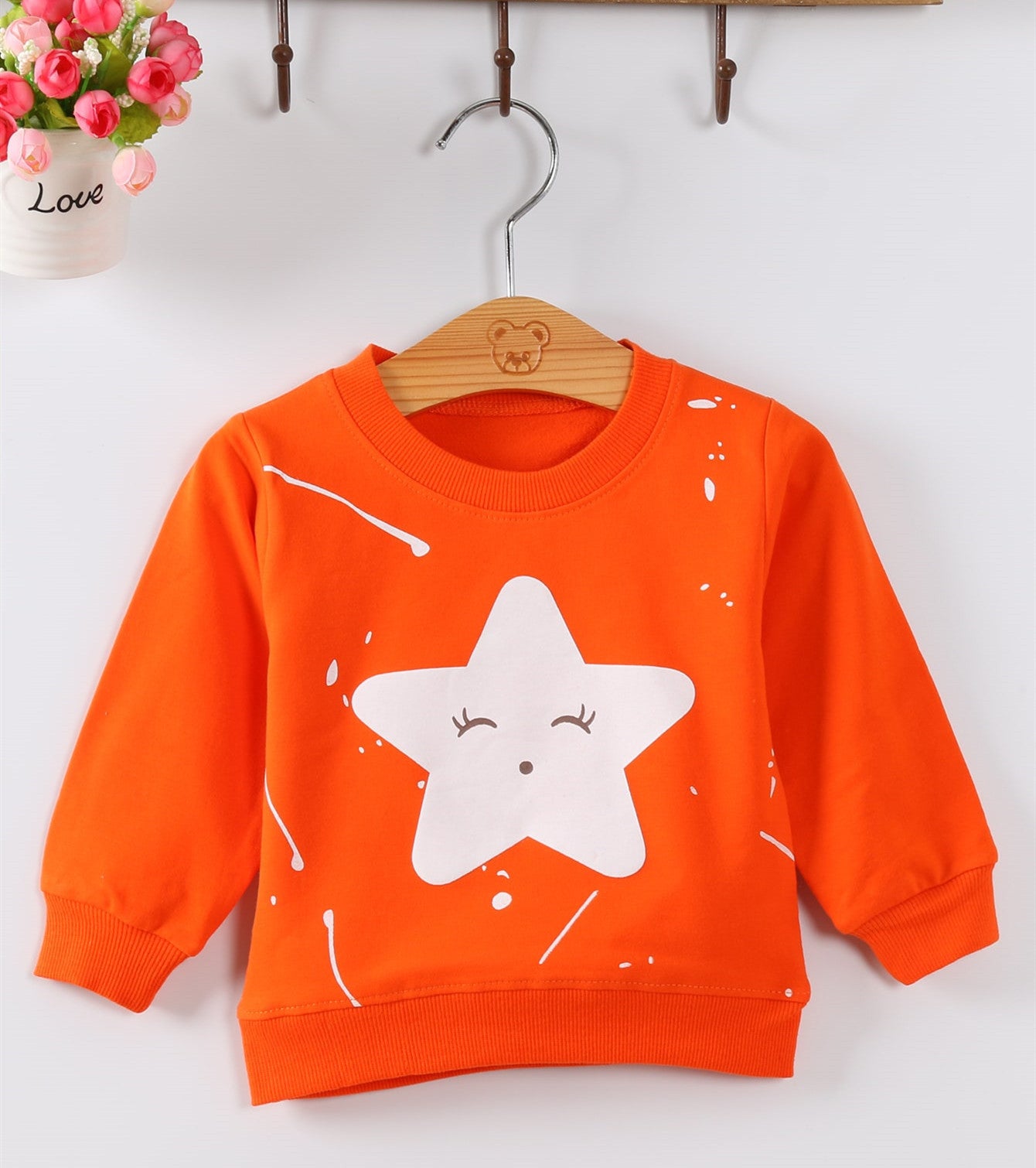 Weibliche Pullover Babykleidung