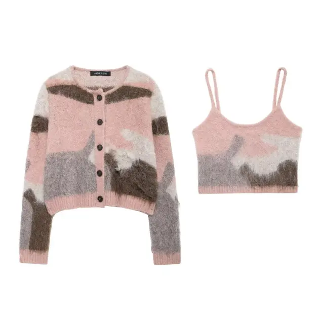 Two piece set of contrasting knitted jacket and suspender
