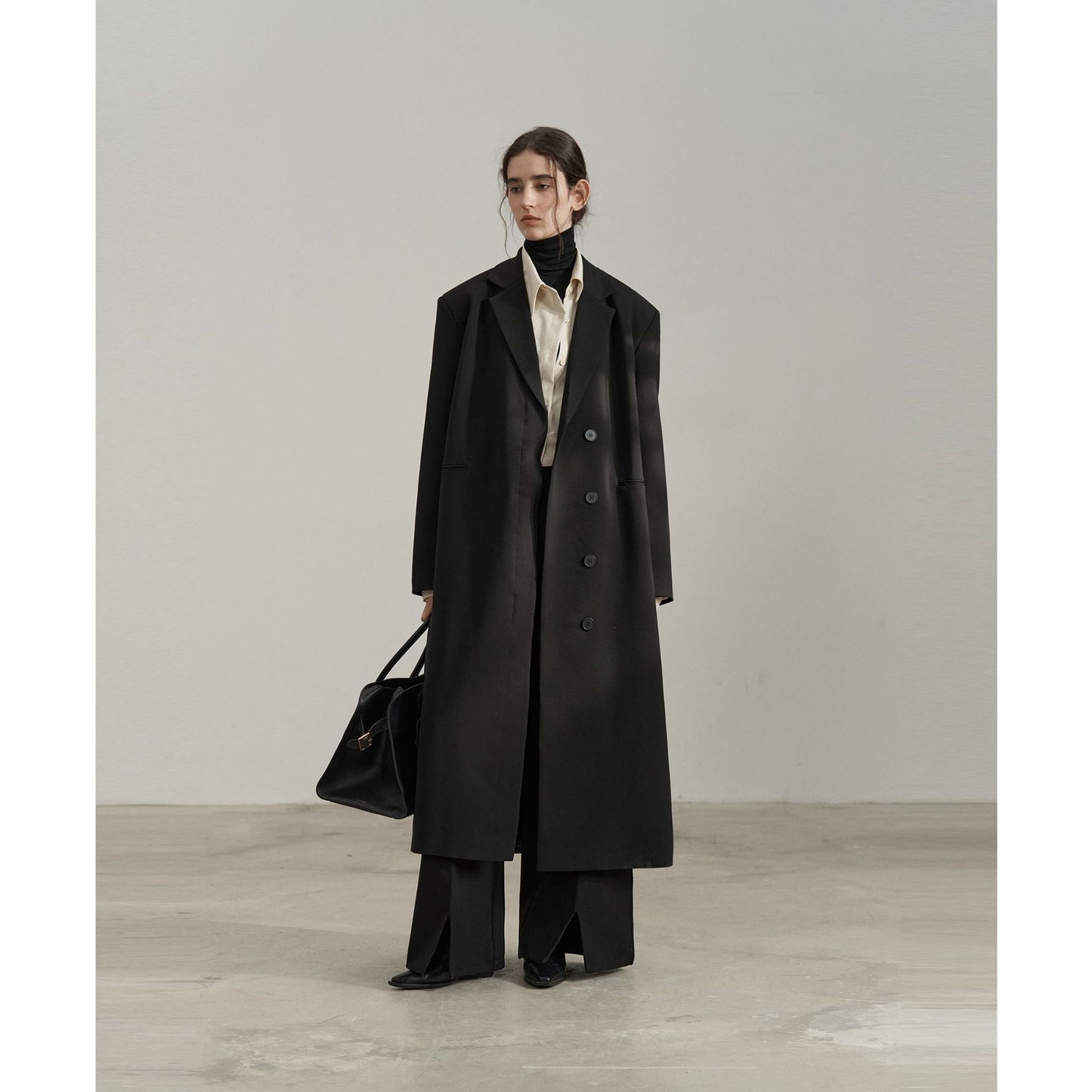 Autumn commuting temperament, black elongated suit jacket, high-end silhouette