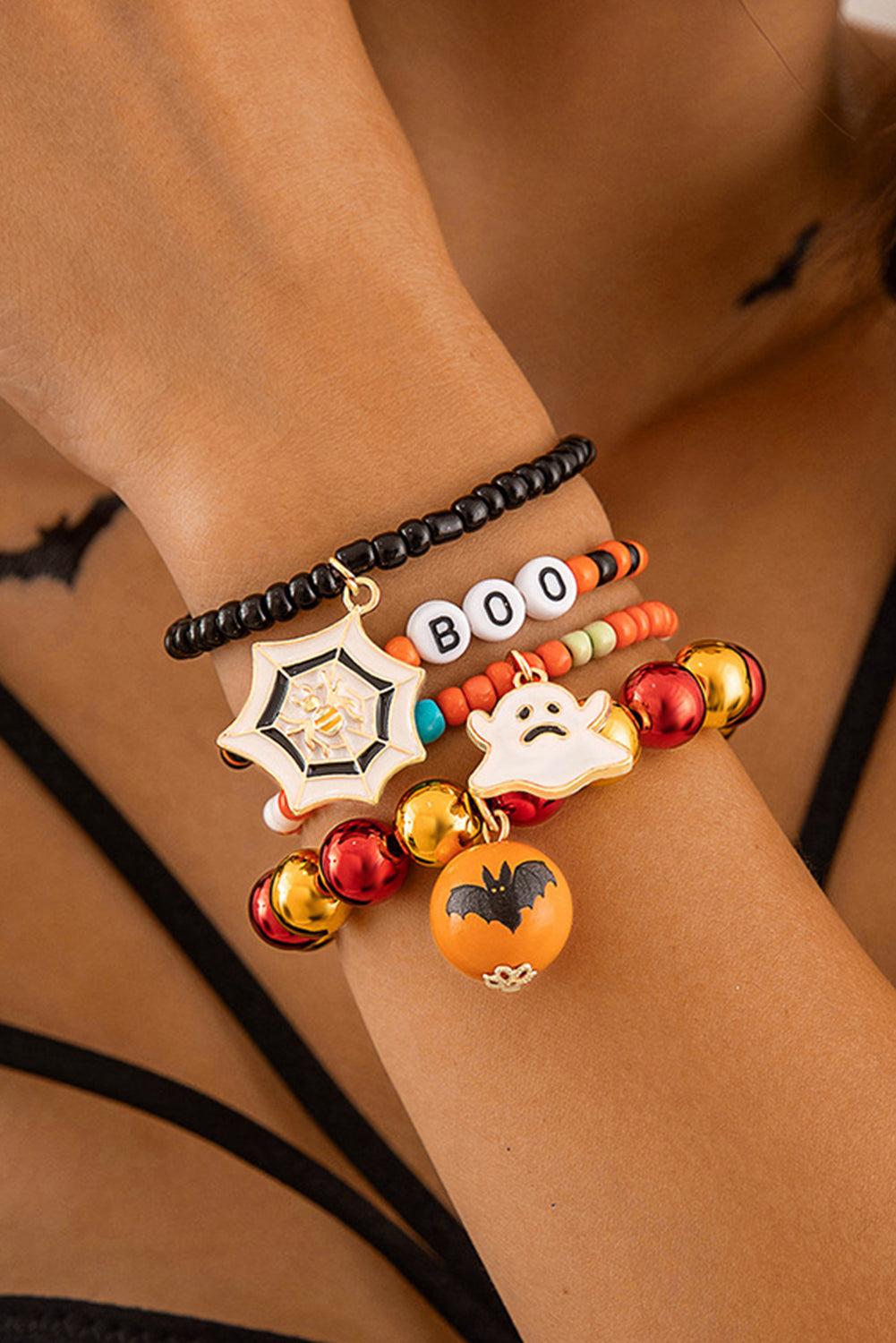 Juego de 4 pulseras de cuentas con telaraña fantasma de Halloween de color naranja