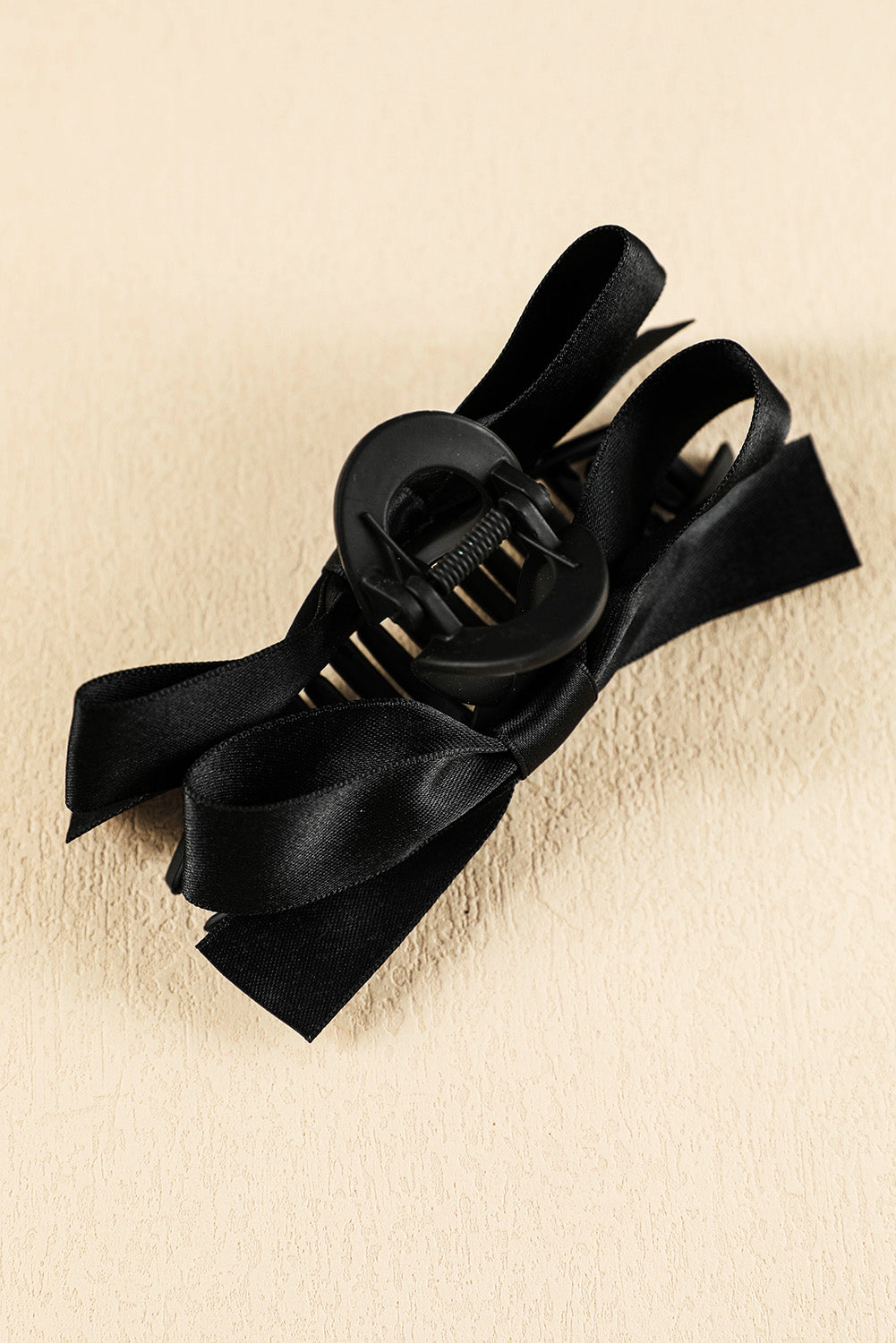 Pinza para el pelo con decoración de lazo negro