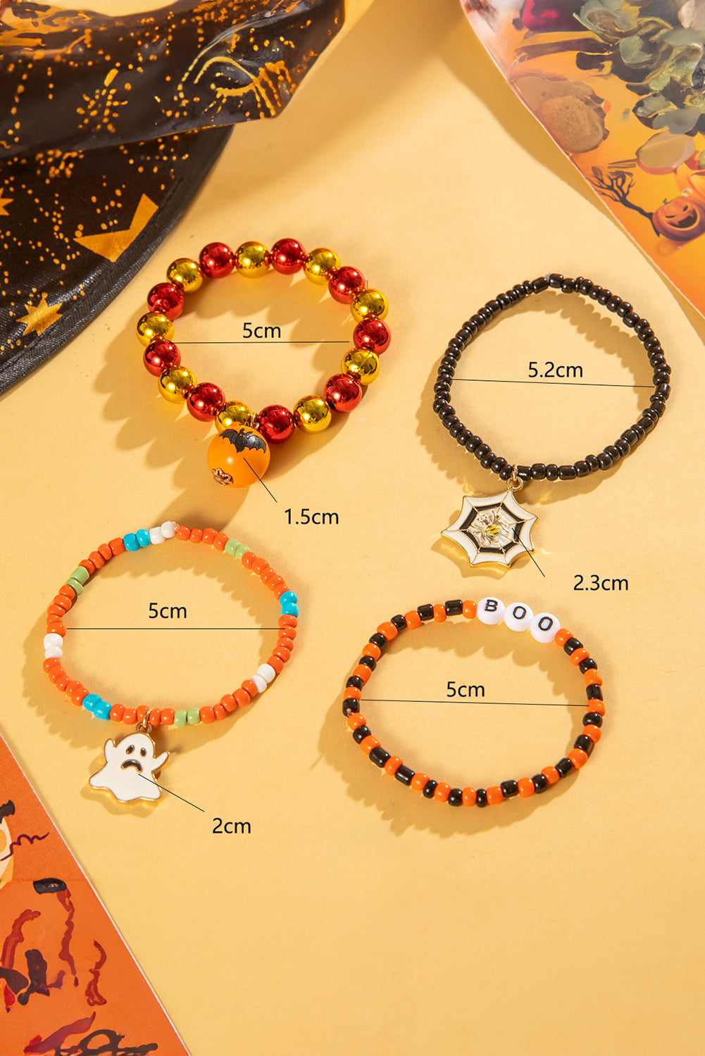 Juego de 4 pulseras de cuentas con telaraña fantasma de Halloween de color naranja