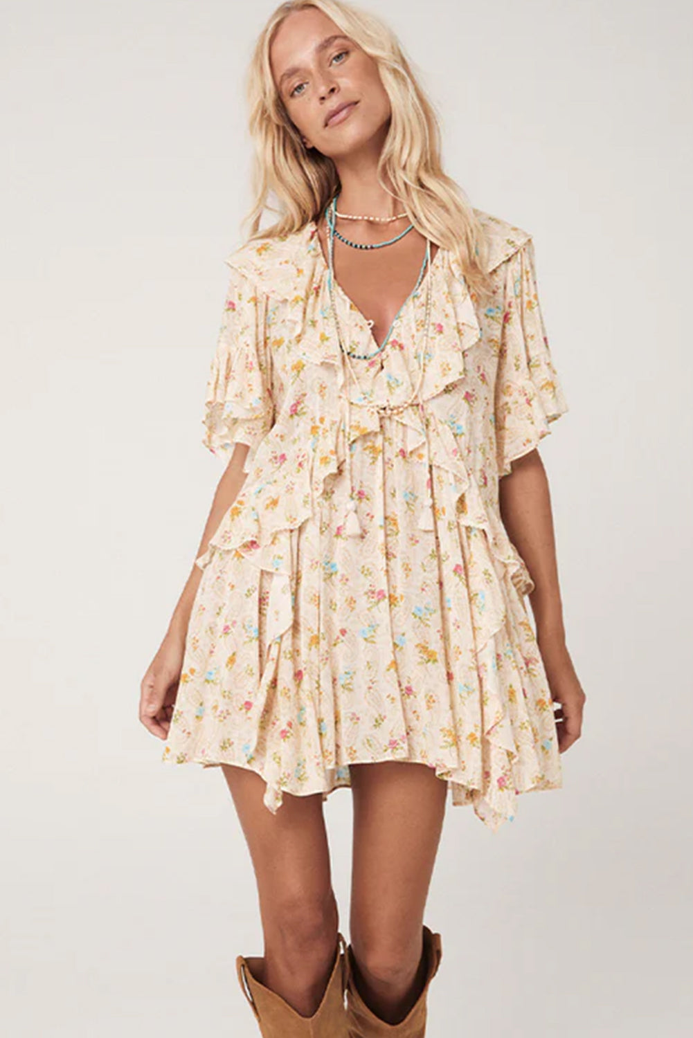 Aprikosenfarbenes Boho-Minikleid mit V-Ausschnitt, Blumenmuster, Quaste und Rüschen